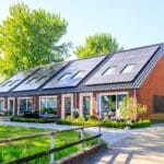 A house with a lot of solar panels on the roof